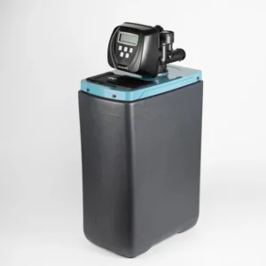 Residential water softener with digital control panel mounted on a teal-blue top of a tall gray tank.