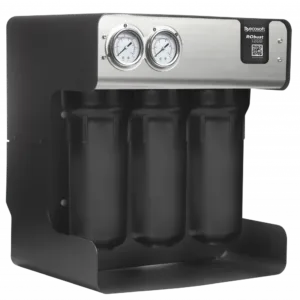 Four-filter industrial water filtration unit with four vertical cartridges and two pressure gauges on a brushed metal panel