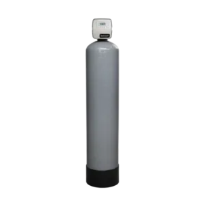 Tall gray water softener tank with a digital control head on top, standing alone in a neutral setting
